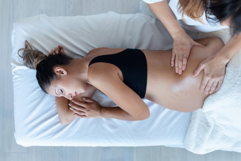 beautiful young physiotherapist woman massaging tu 2024 02 23 05 03 46 utc